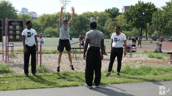 Parkour class for adults at McCarren Park in Williamsburg, Brooklyn