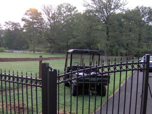 A new automatic satin bronze gate being installed.