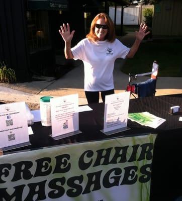 Dawn, the office manager, having fun at a community event