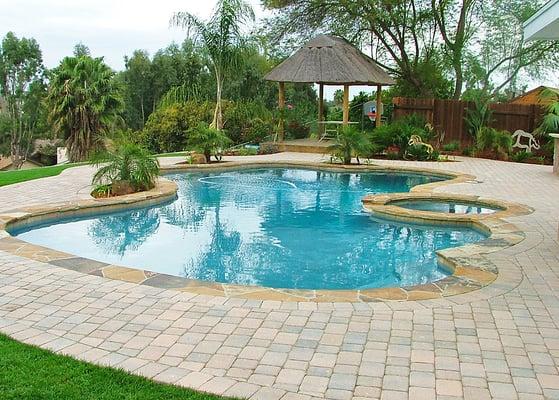 We specialize in backyard makeovers - swimming pool and spa remodels, decking, outdoor living spaces, equipment, solar heating