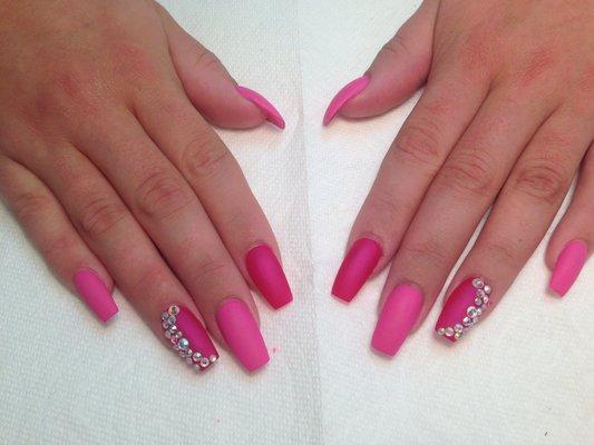 Matte Hot Pink Acrylic Nails with Bling on Ring Finger