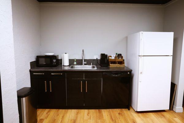 Private kitchen! Equipped with microwave, refrigerator, keurig, coffee, tea, and a culligan water dipsenser!