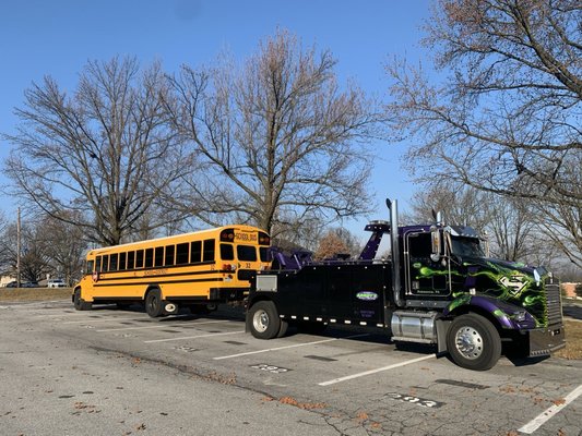 Truck 97 doing a tow for the local school district.