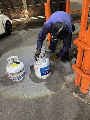 Nice Hard working man filling up tanks around the clock!