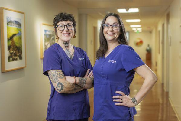 Two cancer nurse navigators pose for a photo.