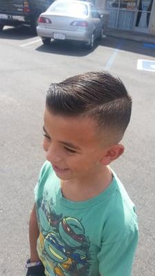 Haircut by Ritchie, my son's go to barber.