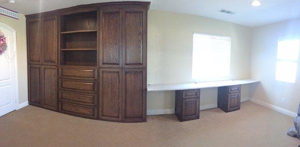 Panoramic photo-- 3 desk stations with laminate that is beautiful and smooth!