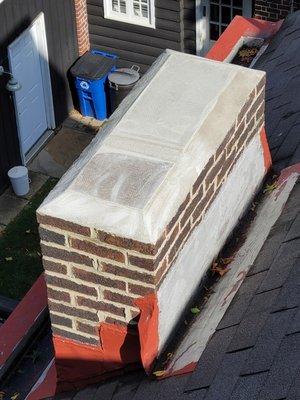 Another chimney well done! We repointed the chimney and then capped it off because it was no longer in use.