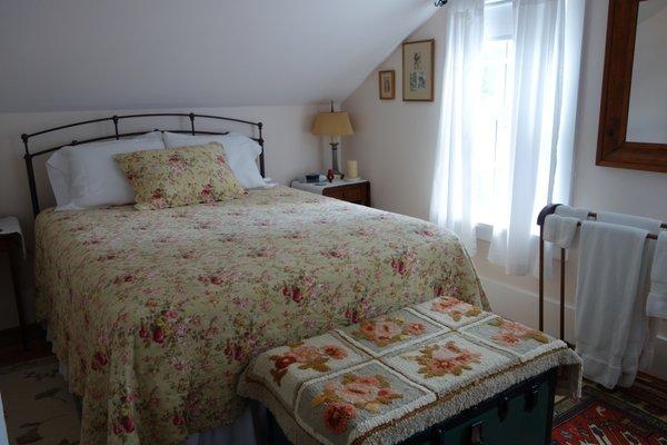 Ellen's Room is upstairs where you will have a queen bed and a twin bed to easily accommodate three guests.