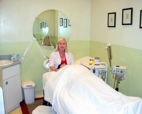 Owner/Esthetician, Dee, in private Skin Care room.