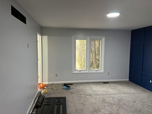 Painted ceilings, walls, and trim in the master bedroom.