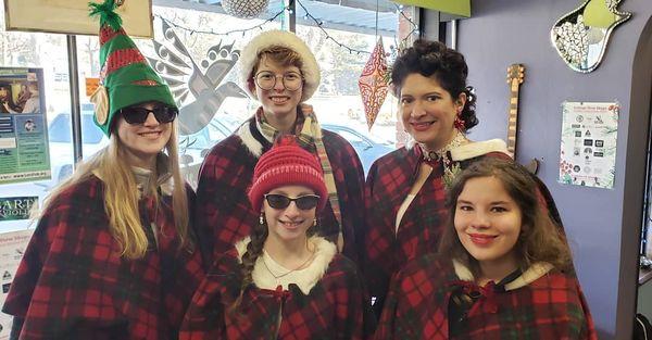 Carolling for the College View Holiday Sale