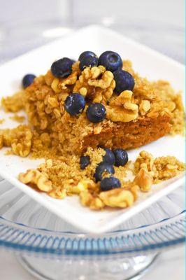 Baked Oatmeal with fresh blueberries, walnuts and brown sugar sprinkled on top