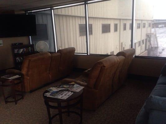 The couch and recliners in the "lounge"