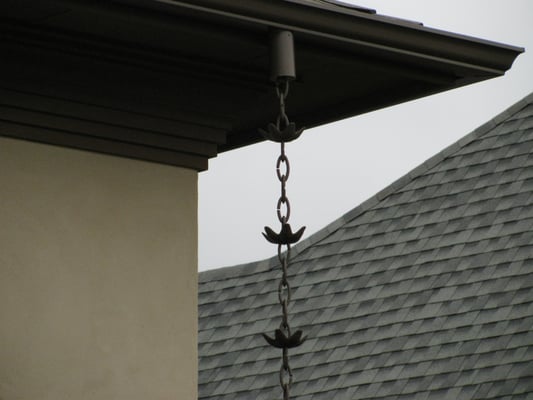 This is a closer view of the Rain Chain. There are many different style's to pick from, for more info Call 373-2724.