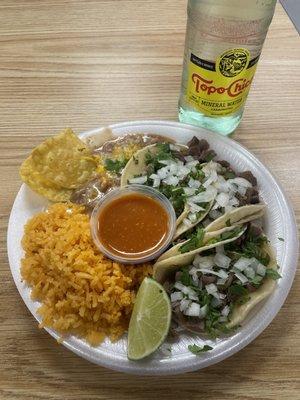 3-tacos plate (lengua) & a Topo Chico!