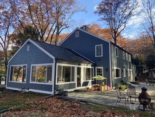 Andersen windows, hardie plank siding and dark bronze gutters