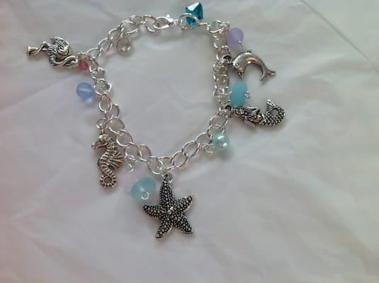 Beach charm bracelet with recycled beach glass and Swarovski crystals.