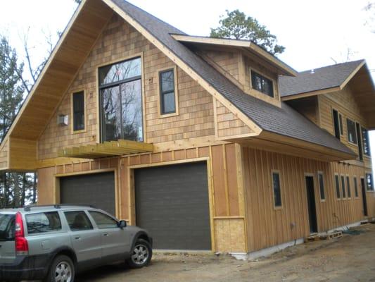 A double garage was added below the master bedroom.