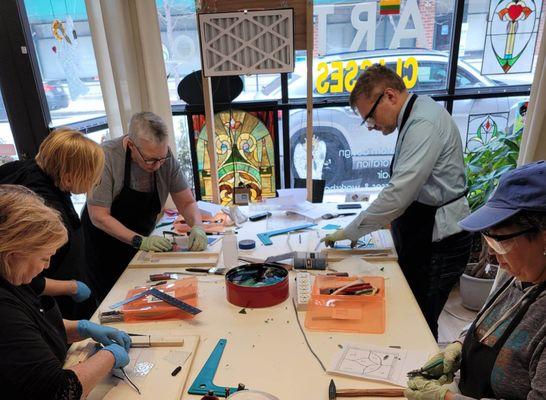 busy students at BAS stained glass class