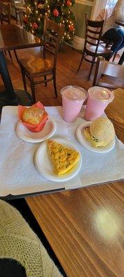 Veggie Fritatta, Blueberry muffin, egg and cheese breakfast sandwich with bacon, 2 strawberry banana smoothies