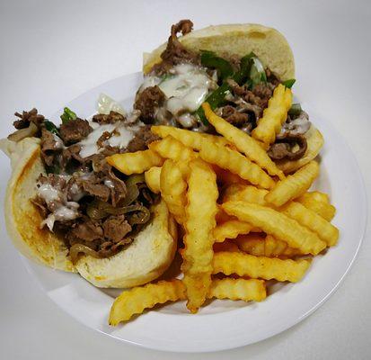 Angus philly cheesteak sandwich with fresh fries