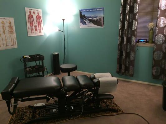 Chiropractic adjustments (on a flexion/distraction table) and muscle therapy by Dr. Young!