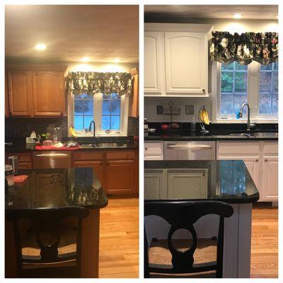 Kitchen cabinets freshly painted white.