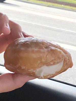 Cream filled glazed donut