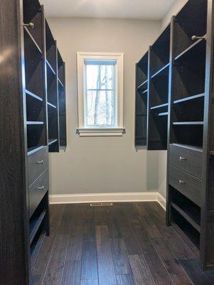 Walk in closet in Espresso finish with centered window