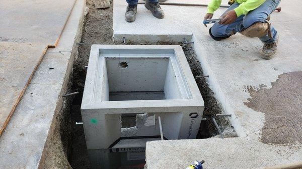 Catch basins with high volume pumps installed.