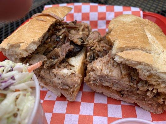 Pig dip. French roll and warm marinera-bbq dip sauce.