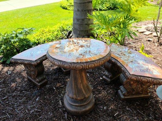 Mosaic table perfect for outdoor seating near my front door