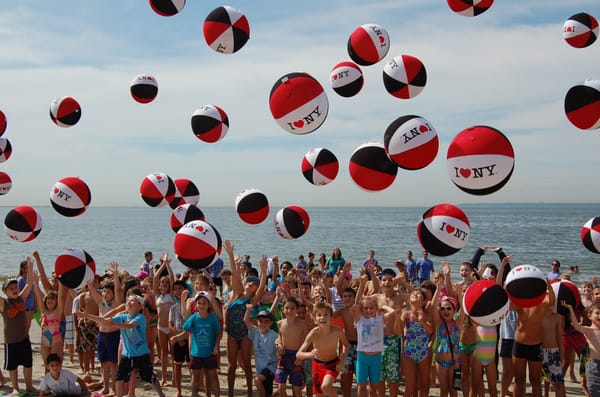 Summer Camp children having fun and enjoying the beach.