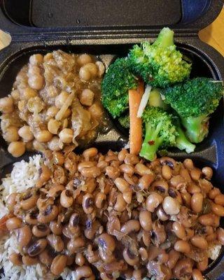 Vegetarian Black Eyed Peas stew with rice and stir fry broccoli sauteed chickpea