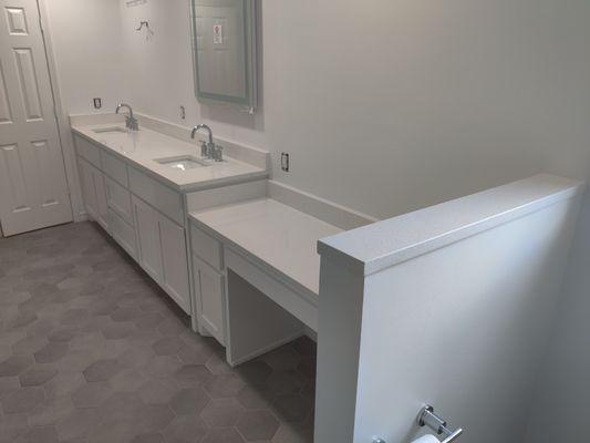 This beautiful double vanity with a make up counter attached!