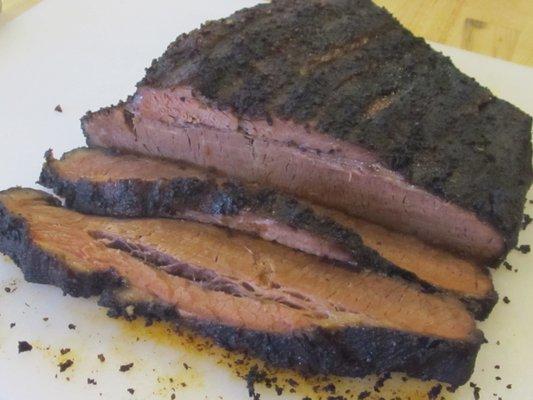 Juicy Mesquite Smoked Texas Style Brisket and Hickory Smoked Alabama Style Pulled Pork. Smells good up in here!