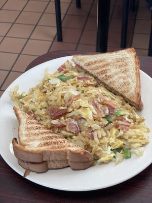 Country scramble, with bacon instead of ham, and White toast.