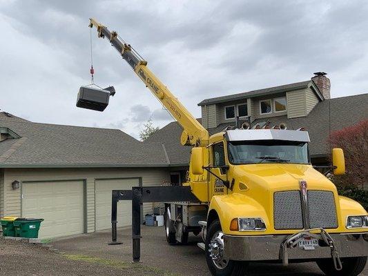 Hot tub move about 60 feet up and over the house