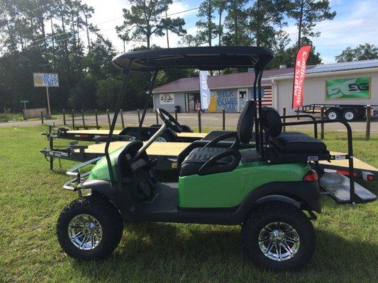 Refurbished w/Camaro green paint. Black seats w/ green double diamond stitch seats.