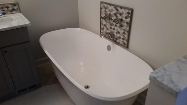 Victoria and Albert tub with in wall Newport Brass faucet