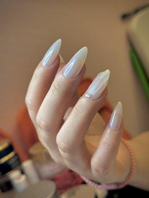 Gel x white chrome mermaid nails.