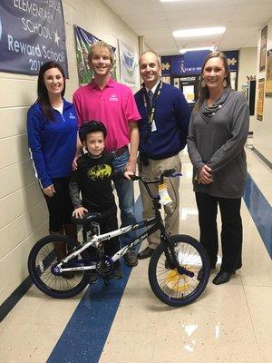 Congratulations to our second big winner of a bike giveaway. This young man had perfect attendance for the first nine weeks o...