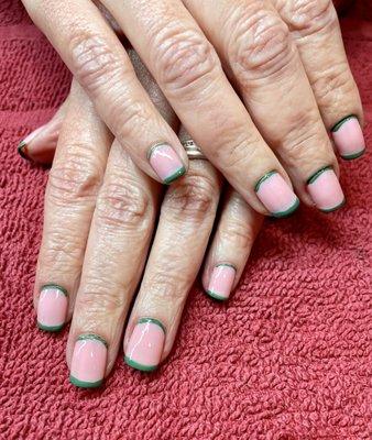 Gel manicure French tips .