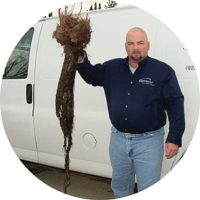 We refer to this as the "Root Squid" that we removed from a line in Oakland.  This handsome guy is Jim, the owner.