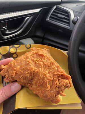 Very large spicy fried chicken thigh