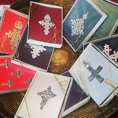 Pile of cards with various design covers of Ethiopian crosses during May 2016 exhibit