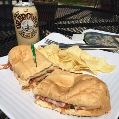 Eggplant parm sub with chips and a cold Dr. Brown's Diet Cream Soda. Hot, fresh, tasty and really nice to eat outside.