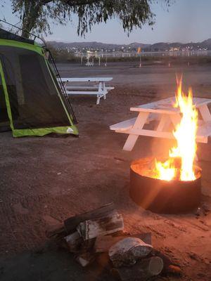 Sit around the fire on the beach at Emerald Bay.