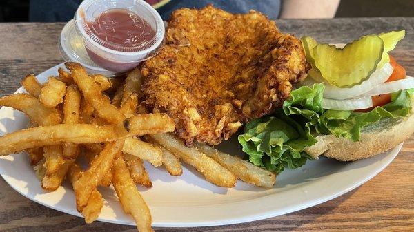 Breaded pork tenderloin and fries.